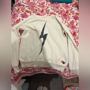 Aviator Nation Cream Sweatshirt with Black Lightning Bolt